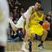 Michigan sophomore Trey Burke dribbles the ball with Indiana junior Will Sheehey on his back during the second half at Assembly Hall on Saturday, Feb. 2 in Bloomington, Ind. Melanie Maxwell I AnnArbor.com